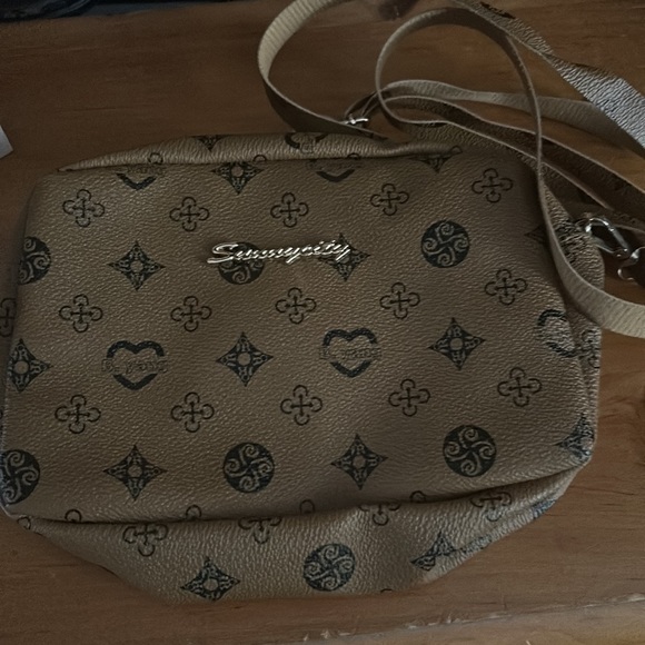 B. Yang brown bag NWOT - Picture 1 of 10